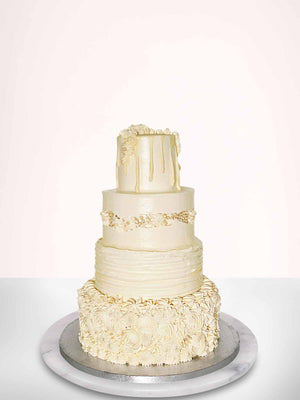 Four-Tiered Buttercream Dream Wedding Cake
