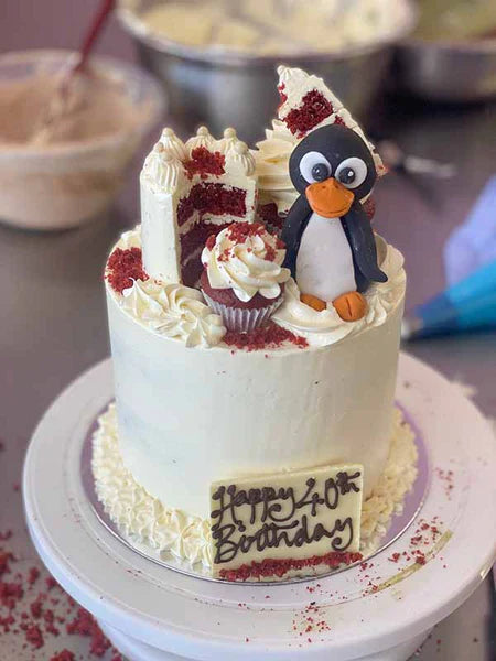A Penguin-Themed Red Velvet Meta Cake