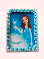 Frozen themed rectangular cake with a picture of Elsa and blue icing border