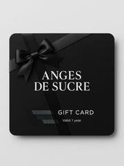 Anges de Sucre gift card with a black ribbon and bow