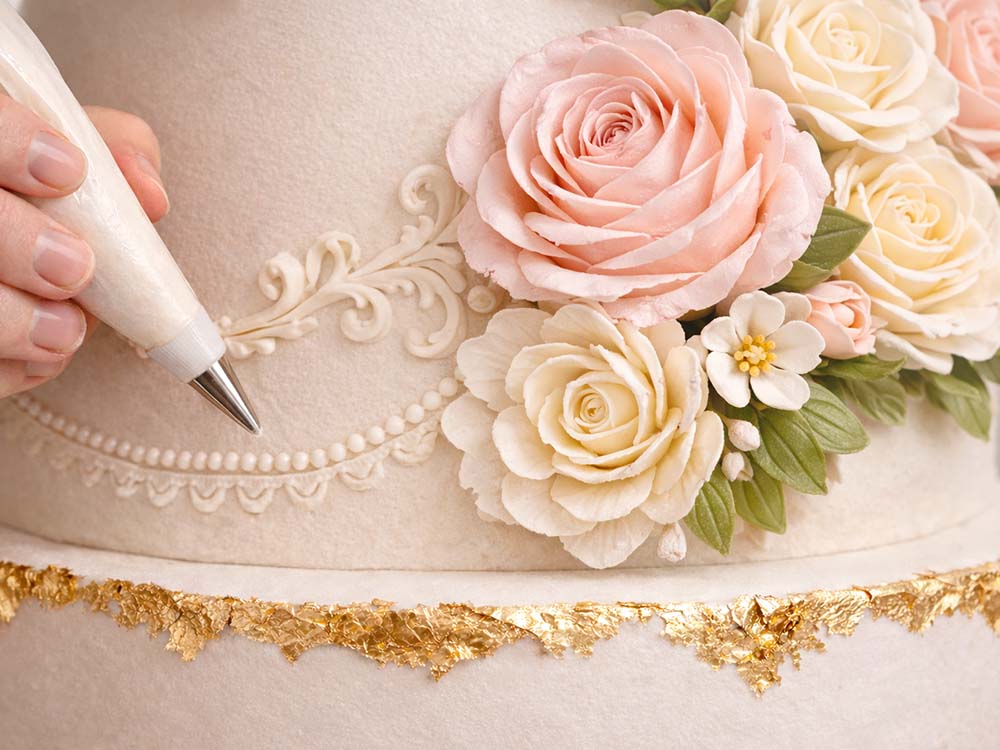 Hand-finished detail on bespoke cake