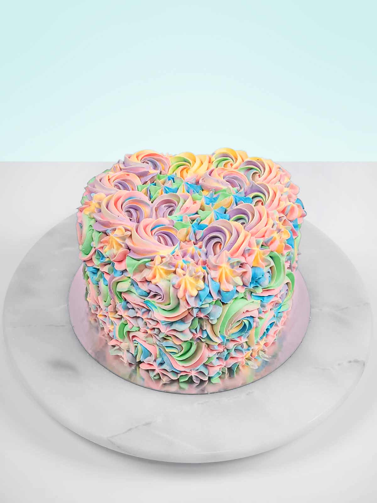 Pastel Rainbow Cake With Macarons