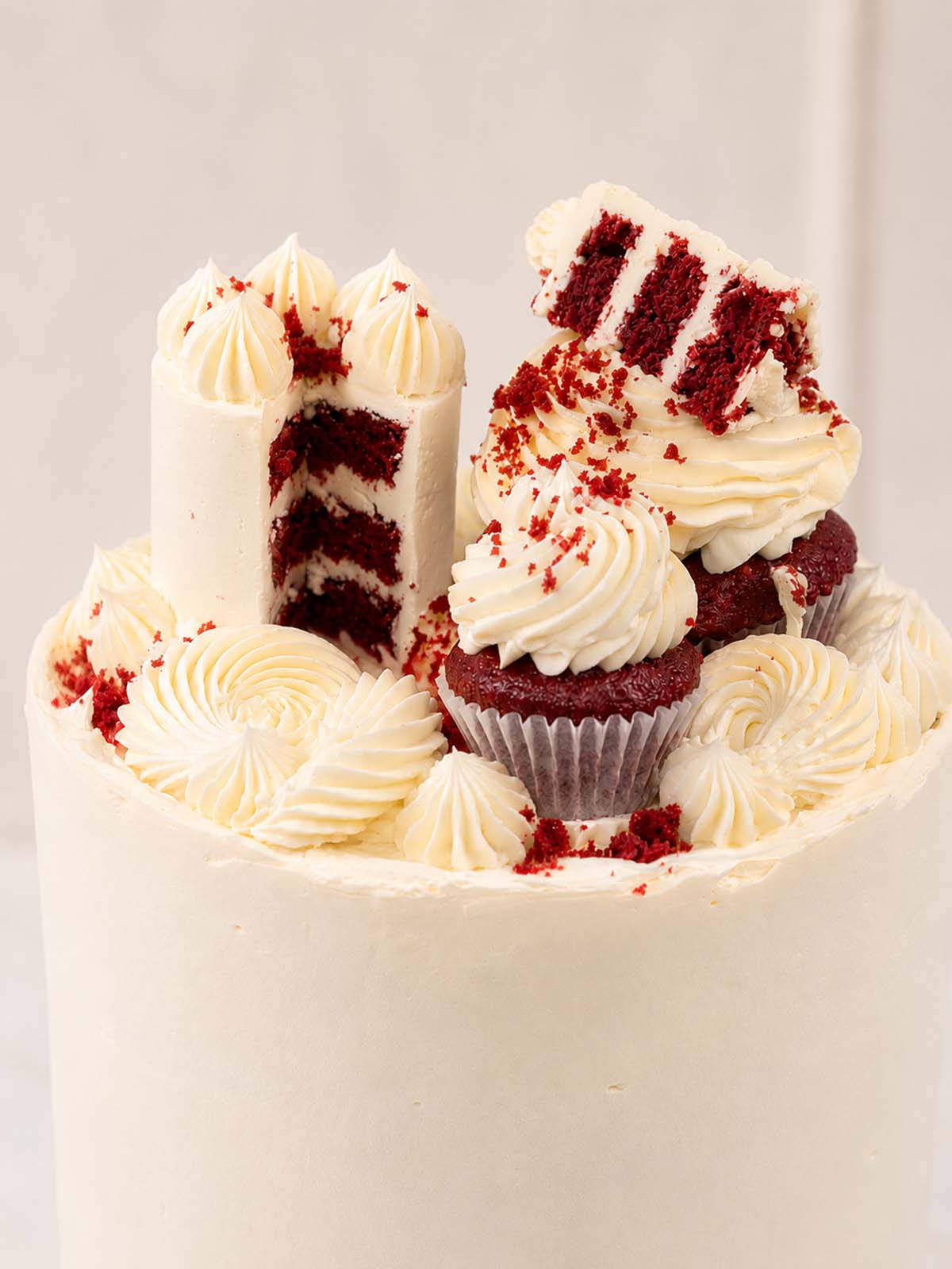 Red velvet cake with cupcakes and cream cheese frosting delivered within London (M25) and Surrey (UK). 