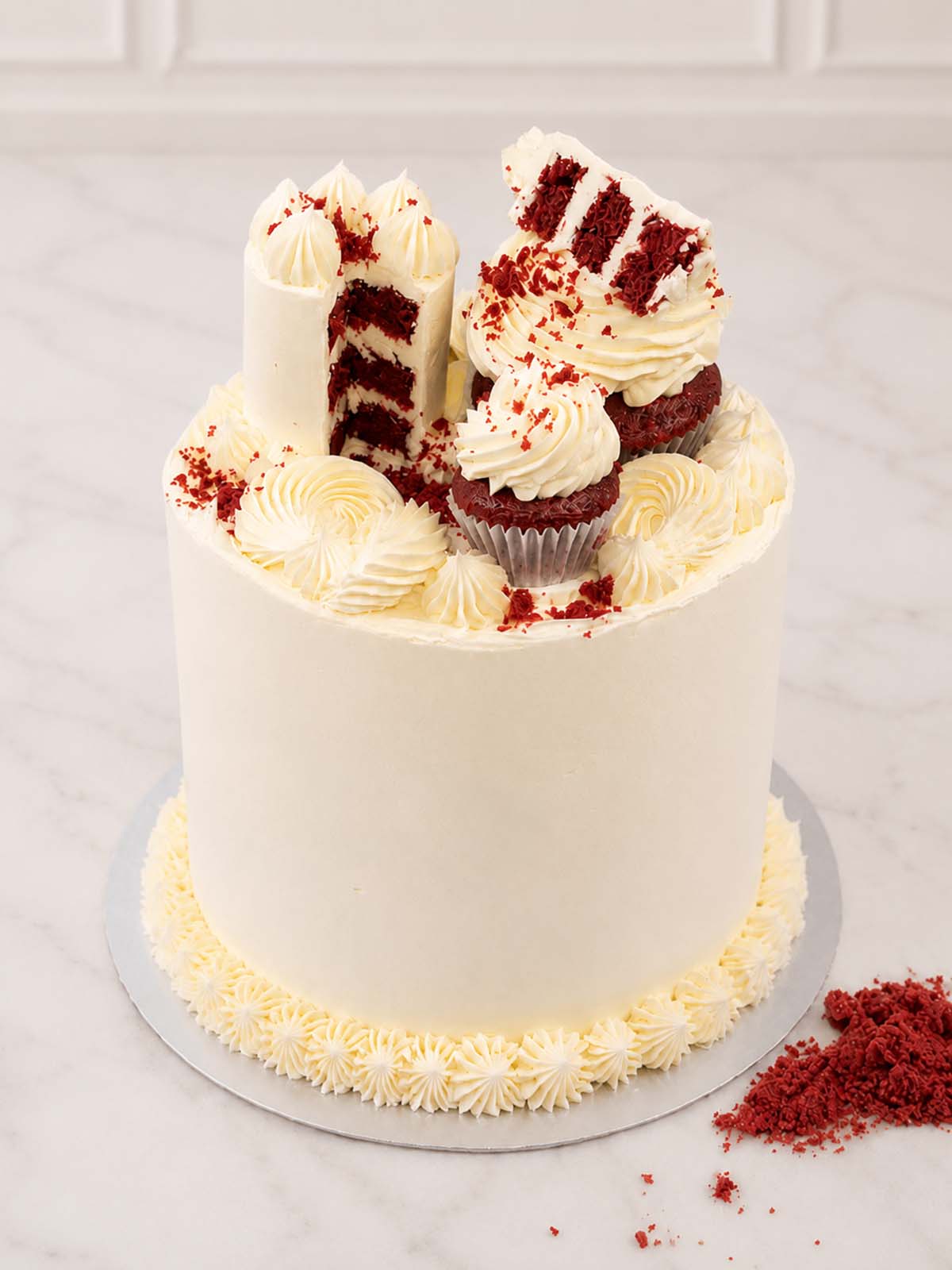 Red velvet cake with white buttercream frosting handmade in London and Surrey.  