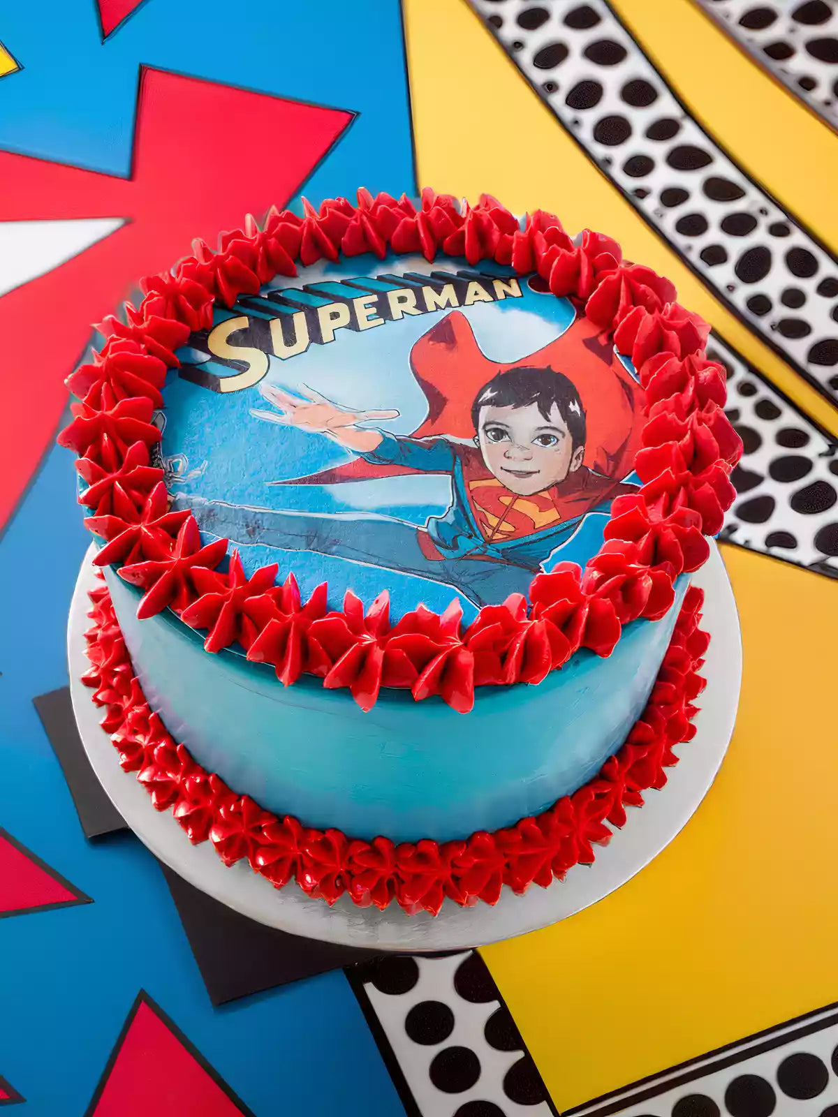 Custom Superman children's birthday cake for London and Surrey delivery