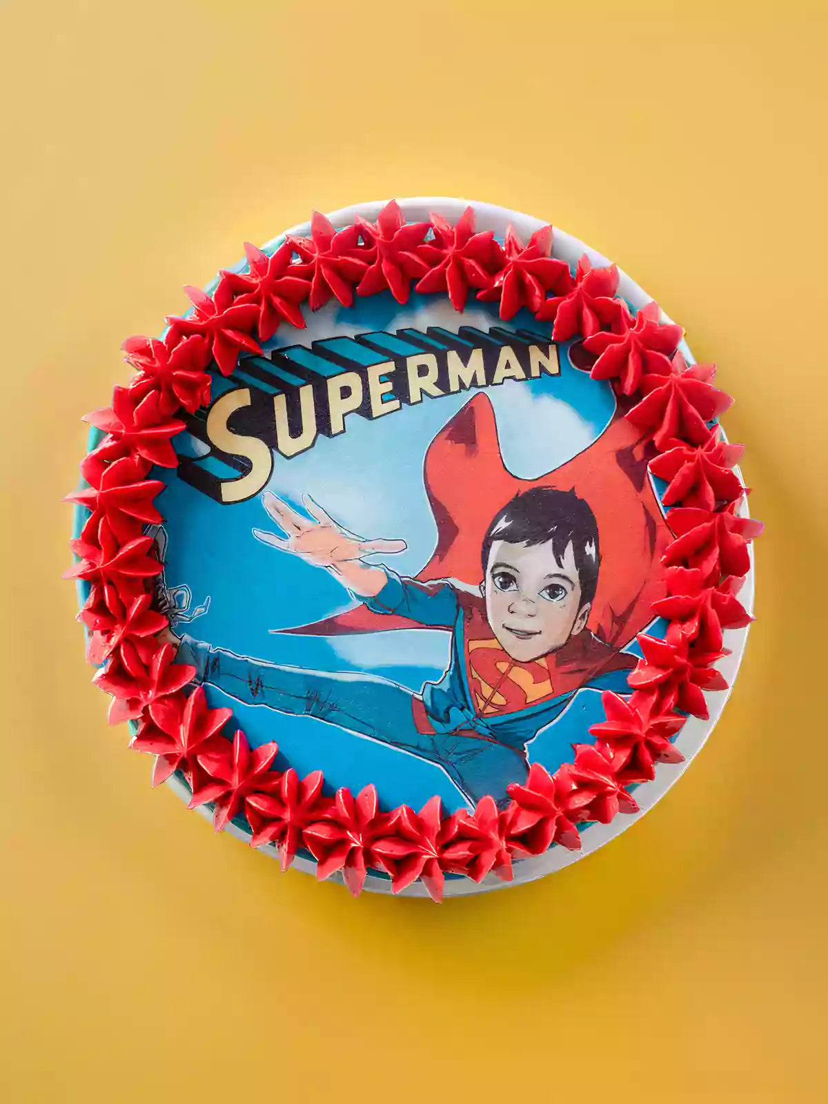 Custom Superman themed birthday cake for London and Surrey delivery