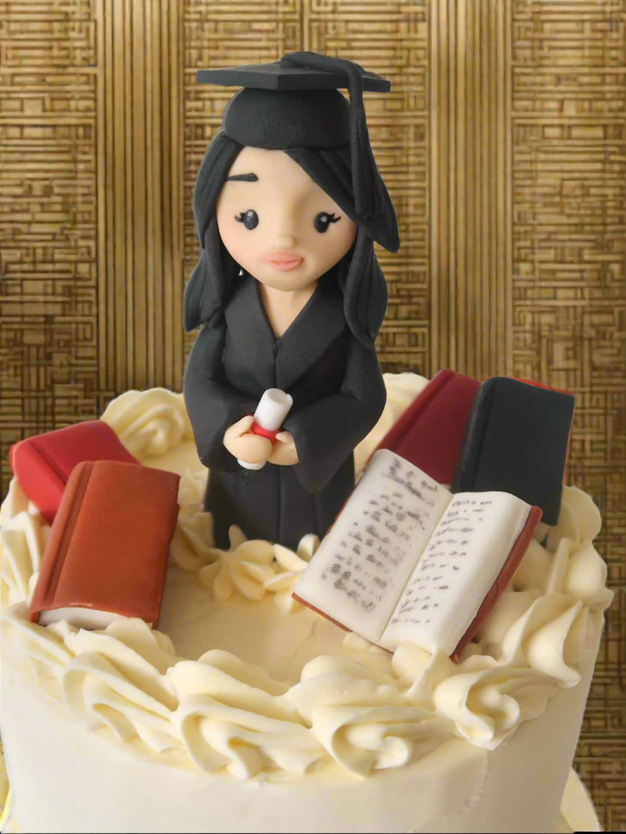 Custom graduation figurine cake for London and Surrey delivery