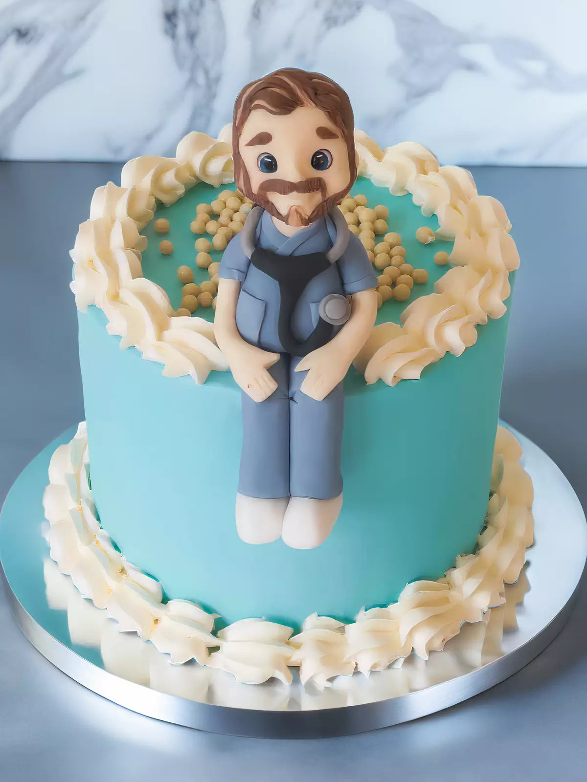 Custom doctor birthday cake with handmade topper for London and Surrey delivery
