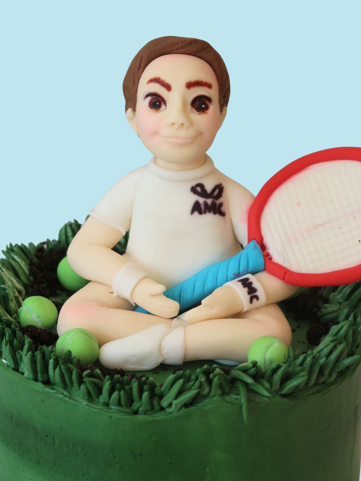 Custom tennis birthday cake with handmade cake topper for London and Surrey delivery