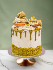 Pistachio deluxe cake with layered sponge and pistachio buttercream, available for cake delivery in London