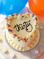 Vintage Heart-Shaped Birthday Cake