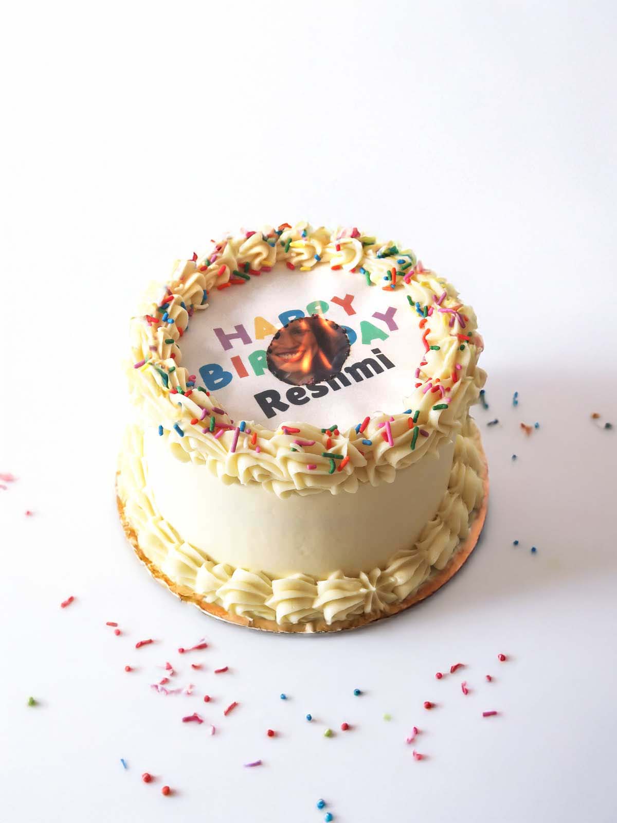 Personalised burn-away photo birthday cake with piped buttercream and birthday message.