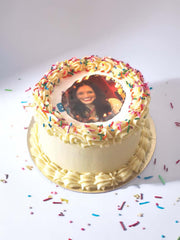 Burn-away birthday cake designed to reveal a personalised edible photo.