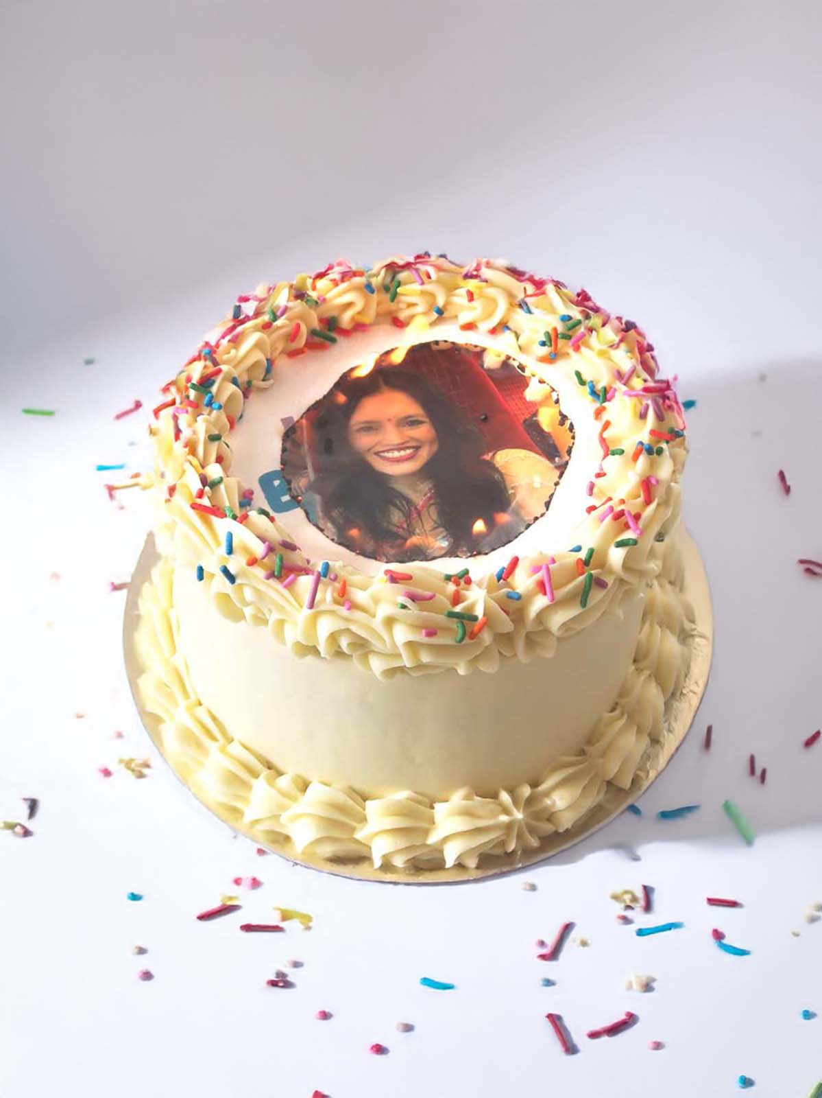 Burn-away birthday cake designed to reveal a personalised edible photo.