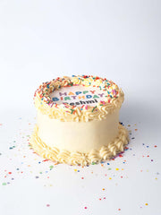 Personalised photo birthday cake with burn-away reveal and buttercream finish.