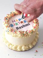 Burn-away photo birthday cake with a personalised edible image and smooth buttercream finish.