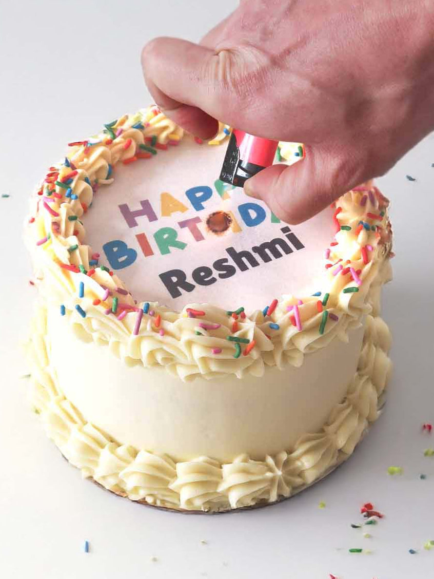 Burn-away photo birthday cake with a personalised edible image and smooth buttercream finish.