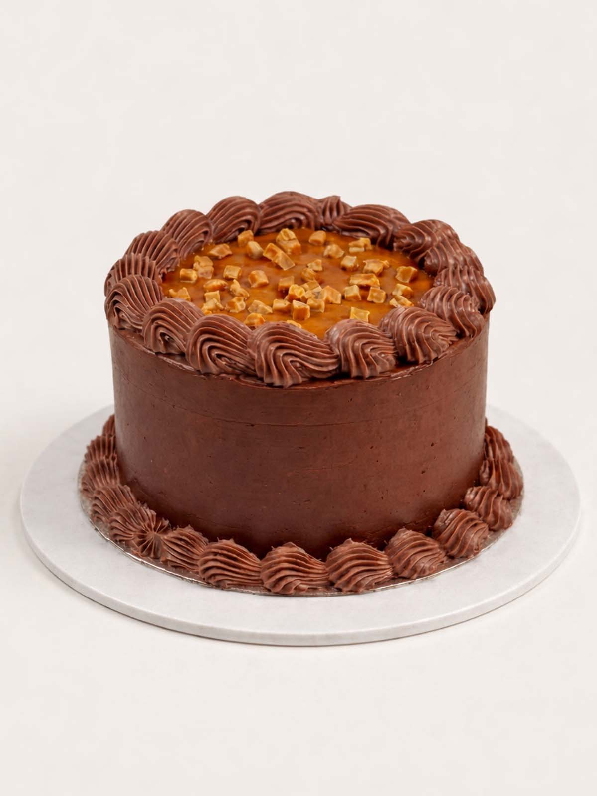 Chocolate fudge birthday cake showing rich chocolate buttercream texture, delivered in London