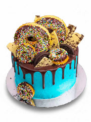 Doughnut Cookie Monster birthday cake showing blue buttercream texture and doughnut decoration, delivered in London