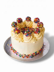 Funfetti truffle birthday cake showing colourful sprinkle buttercream detail