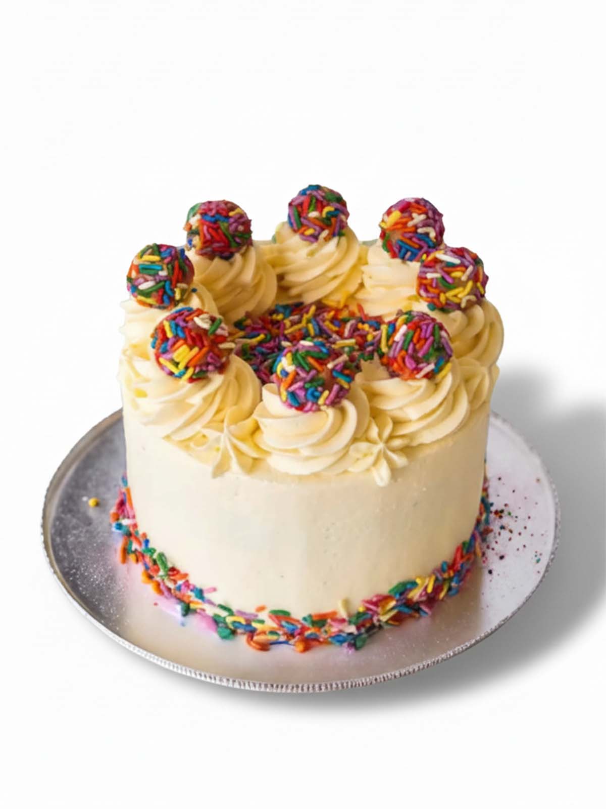 Funfetti truffle birthday cake showing colourful sprinkle buttercream detail, delivered in London