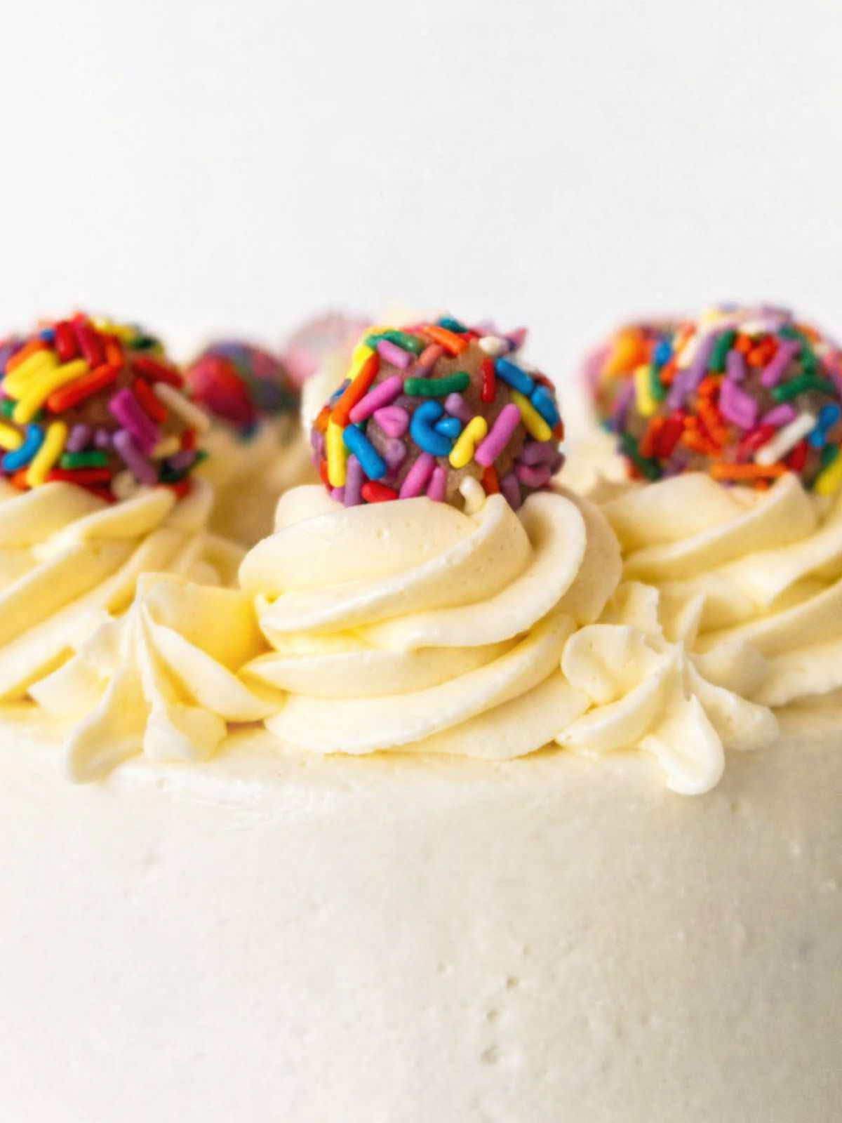 Funfetti truffle birthday cake close up showing colourful funfetti