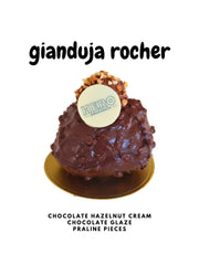 Gianduja Rocher doughnut with chocolate hazelnut cream, chocolate glaze, and praline pieces