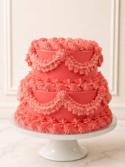 Customisable vintage wedding cake featuring intricate Swiss meringue buttercream piping and tiered sponge layers. Available for free
