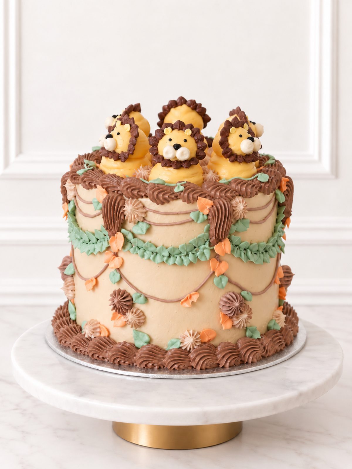 Kitsch Lion Cake with hand-piped buttercream lions and floral piping