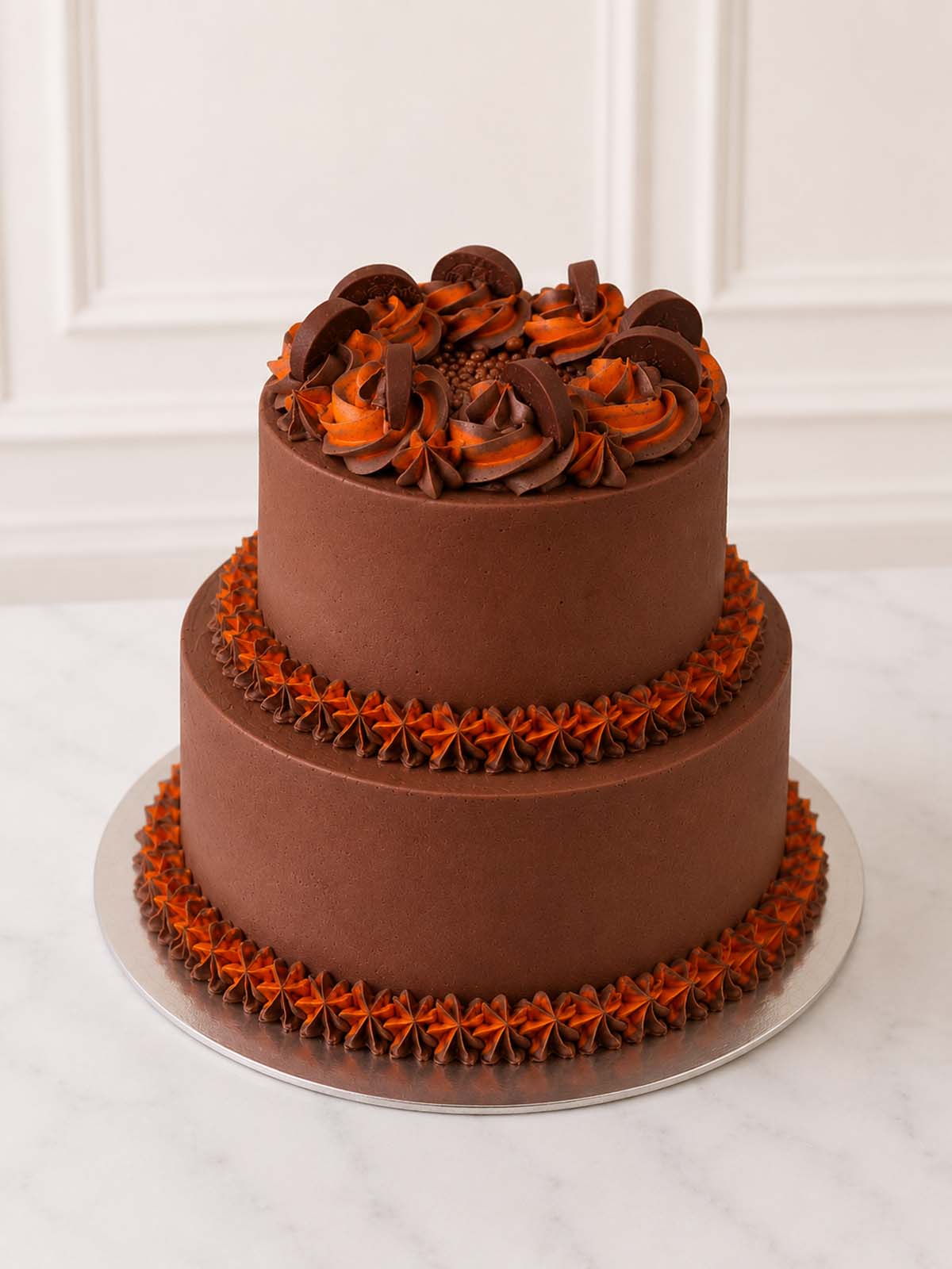 Luxury artisan cocoa-rich chocolate orange cake with silky buttercream, London & Surrey.