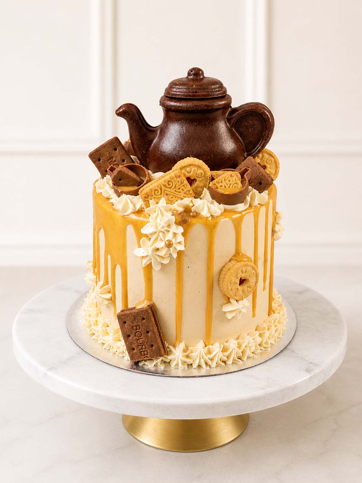 Luxury biscuit lover's Lotus and caramel teapot cake, London & Surrey.
