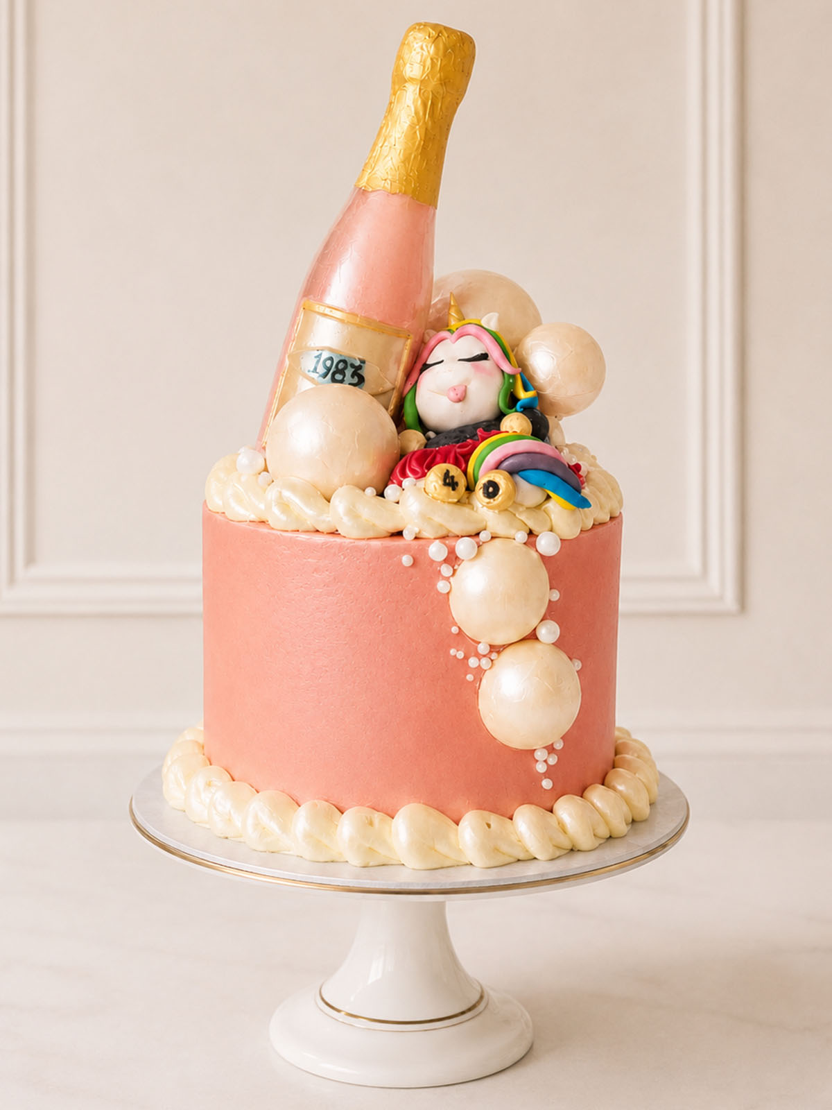 Luxury champagne bottle and party unicorn vanilla cake, London & Surrey.
