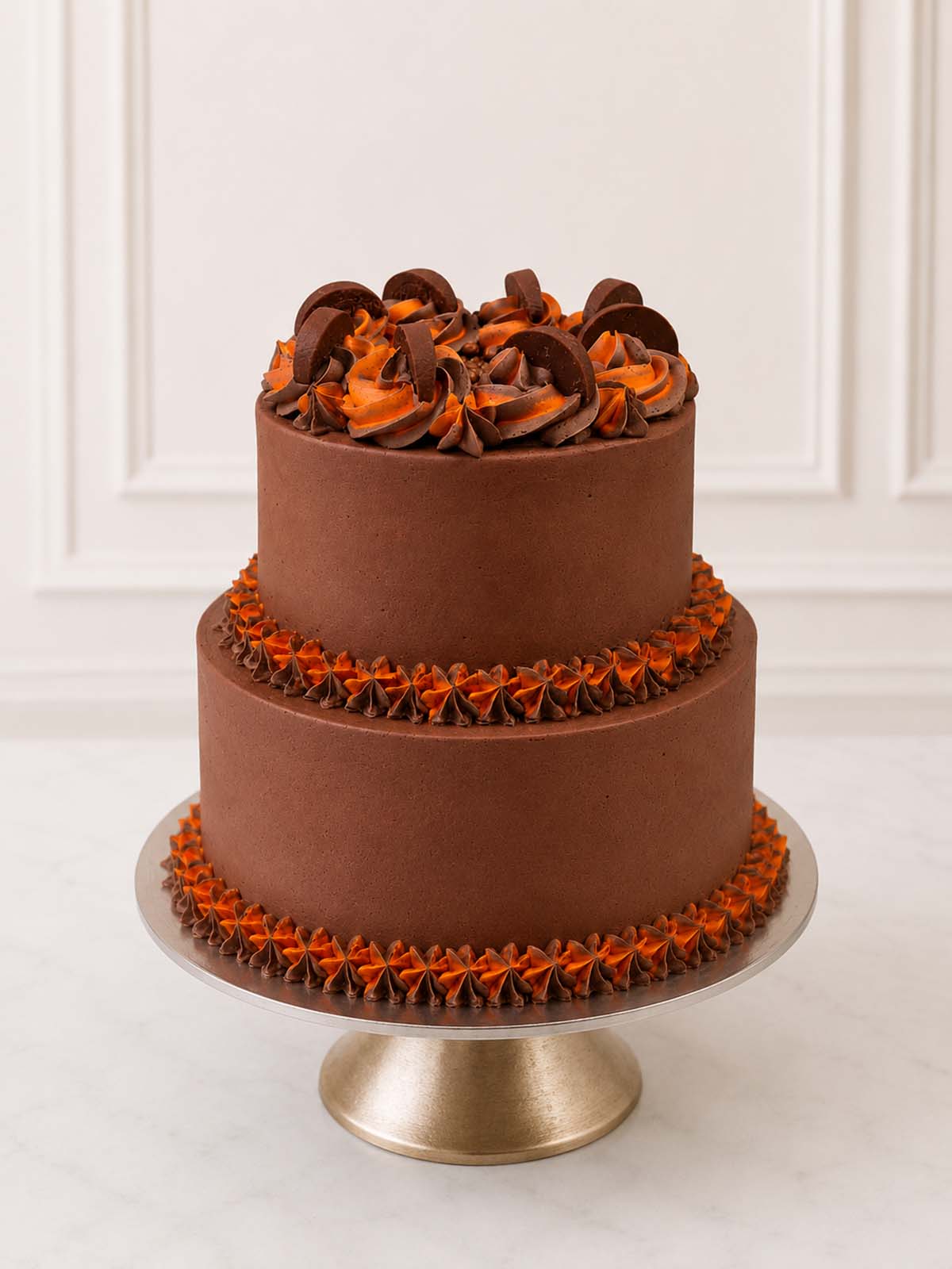 Luxury chocolate orange celebration cake with buttercream swirls, London & Surrey.