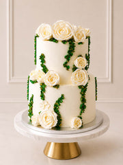 Luxury ivory hand-piped rose and gold wedding cake, London & Surrey.