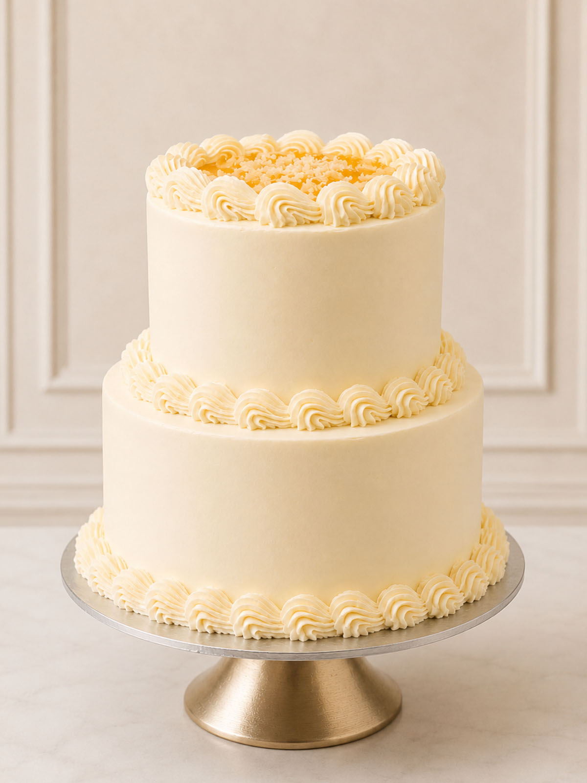 Luxury lemon drizzle celebration cake with homemade curd, London & Surrey.