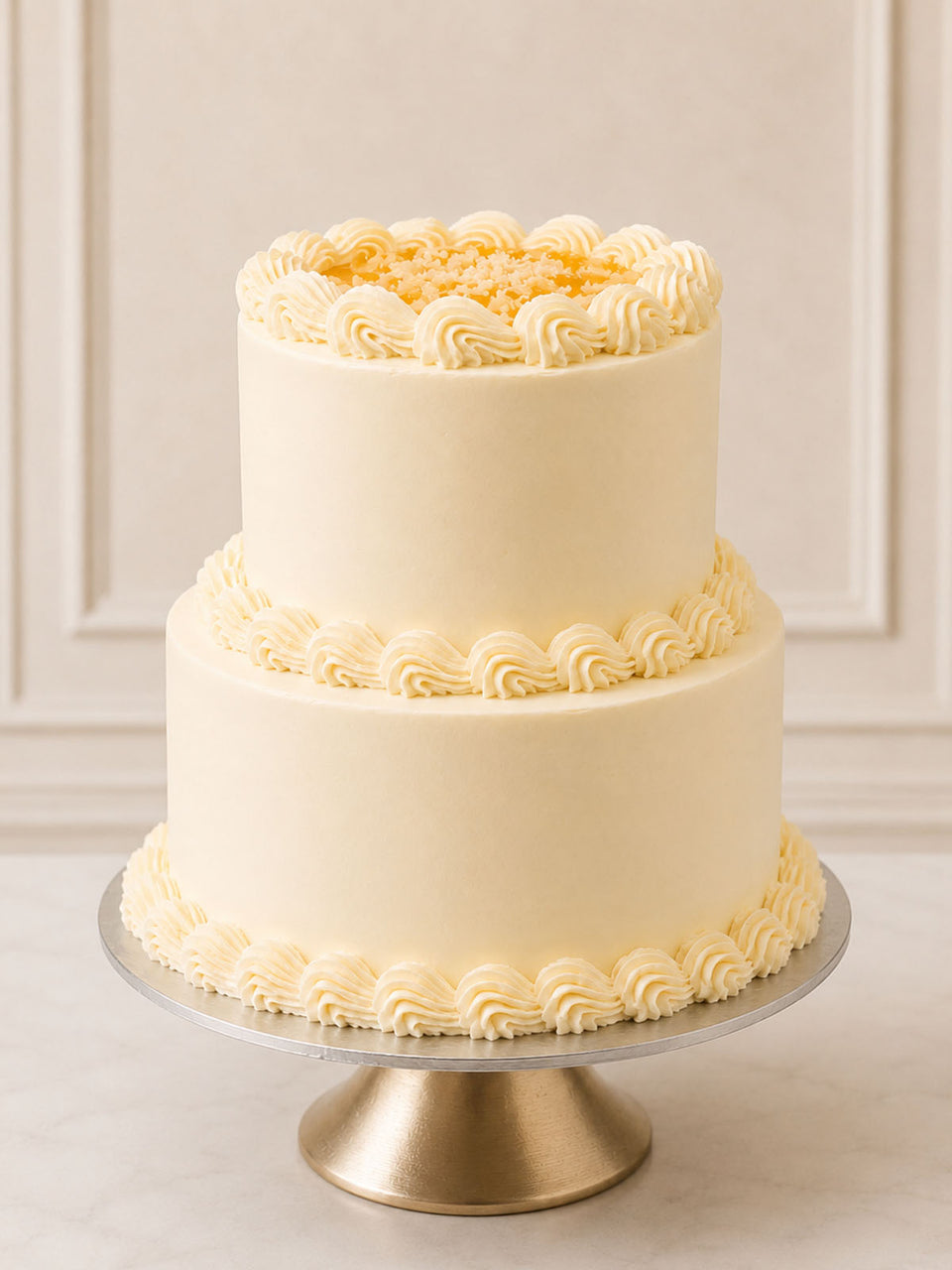 Luxury lemon drizzle celebration cake with homemade curd, London & Surrey.
