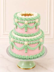 Luxury pistachio and raspberry cake with pink and green vintage piping, London & Surrey.