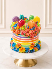 Luxury five-layer rainbow fault line cake with macarons, London & Surrey.