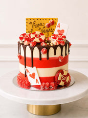 Luxury Las Vegas casino themed red velvet cake with poker chips, London & Surrey.