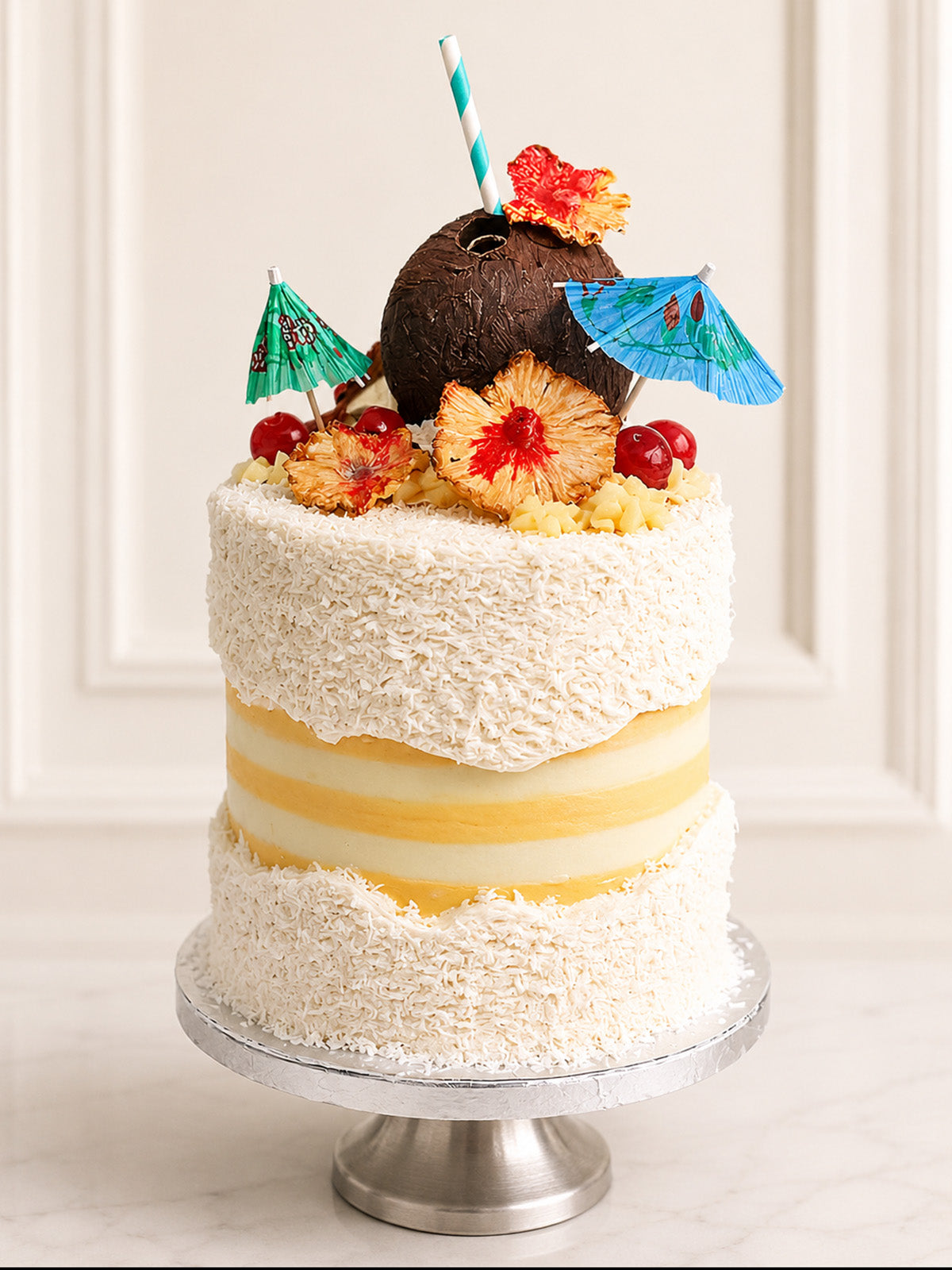Luxury tropical pineapple and coconut fault line cake, London & Surrey.