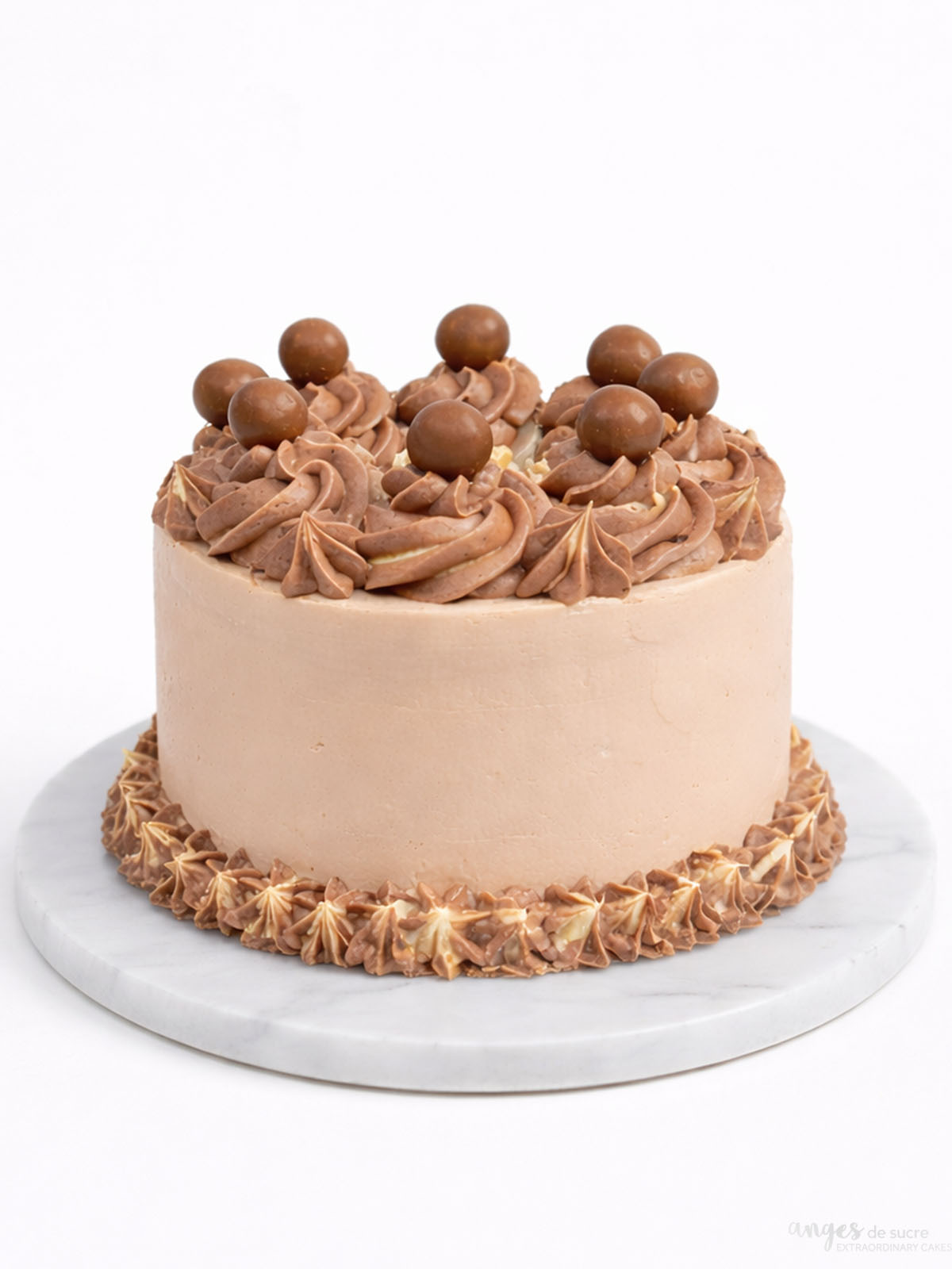 Malteser birthday cake with chocolate buttercream and Malteser topping, delivered in London