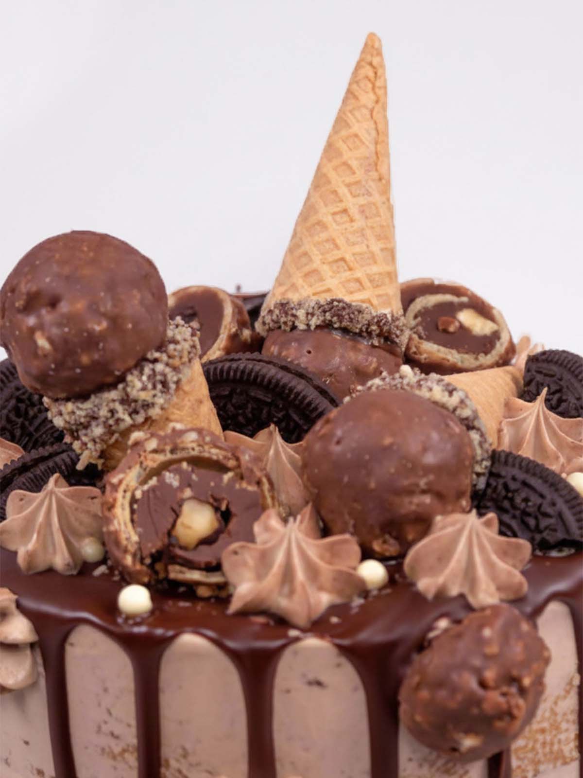 Nutella and Ferrero Rocher birthday cake close up shot showing the cakes decorations , delivered in London