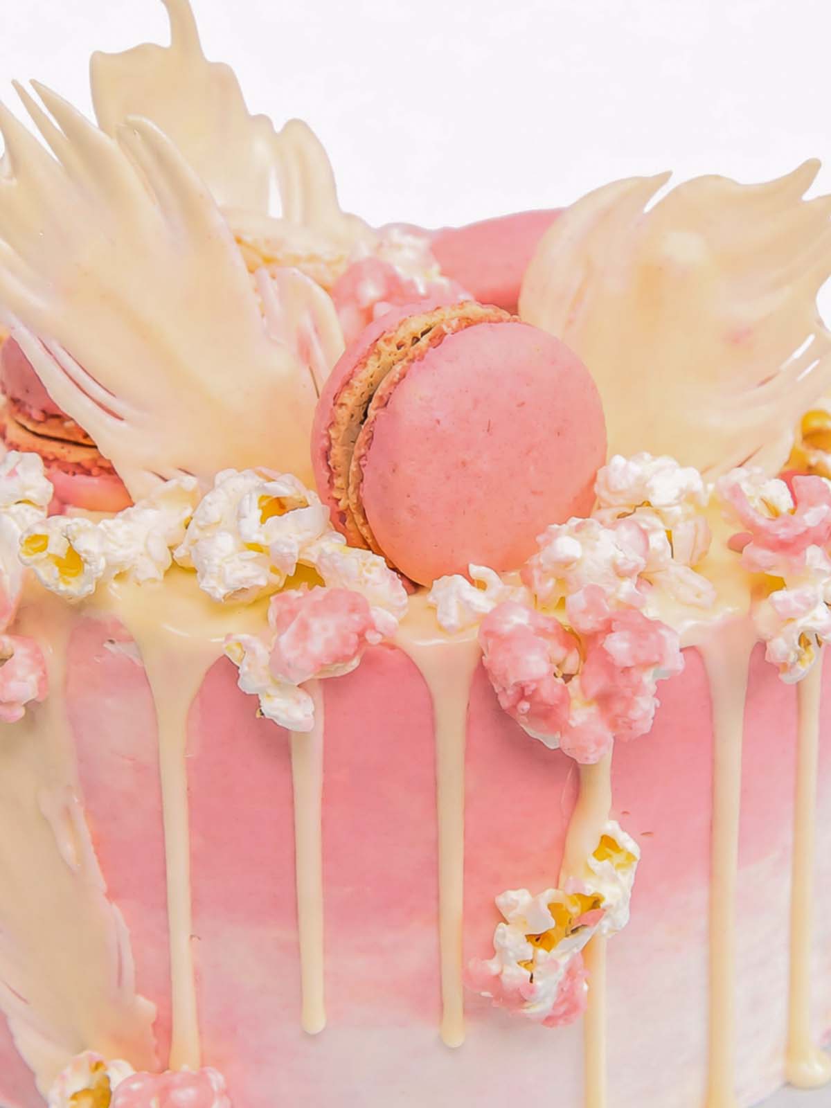 Pink flamingo birthday cake showing bright pink buttercream and flamingo decoration, delivered in London