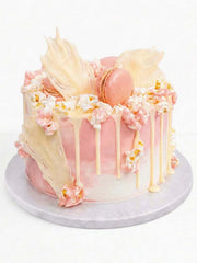 Pink flamingo birthday cake with bright pink buttercream and flamingo decoration, delivered in London