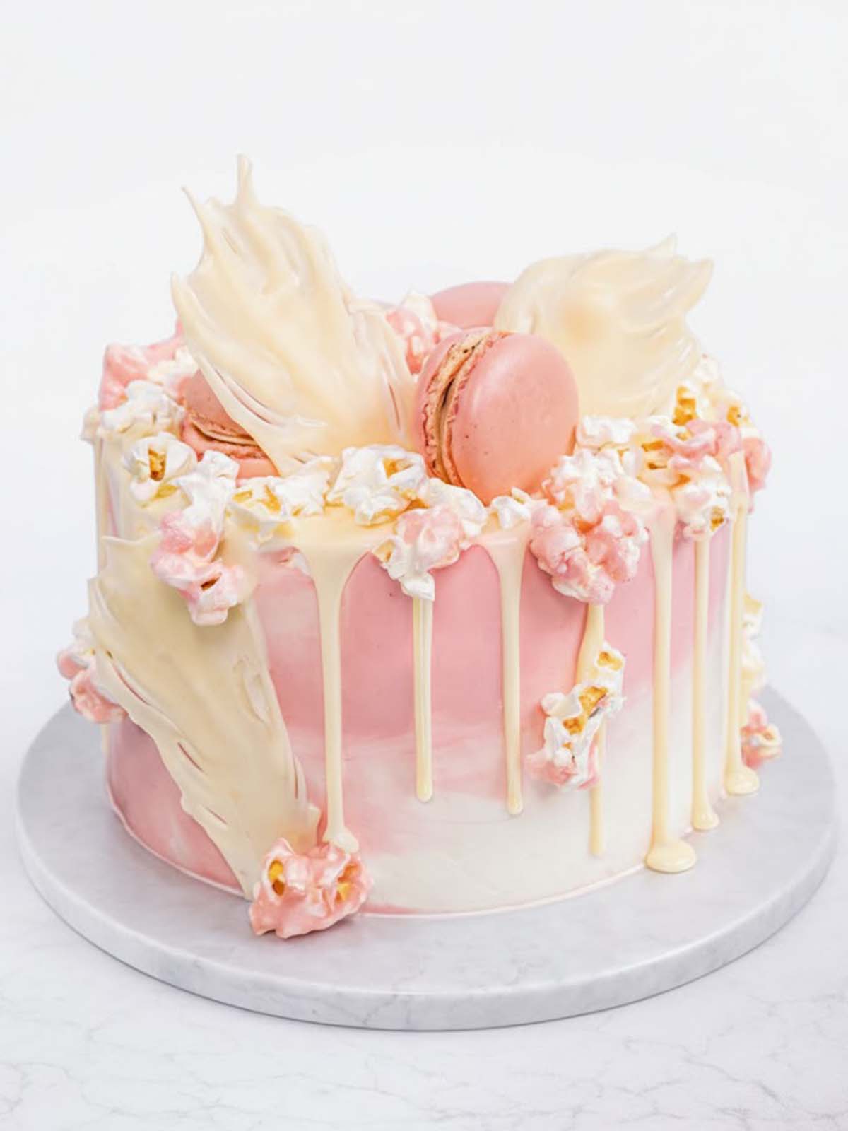 Pink flamingo birthday cake with bright pink buttercream and flamingo decoration, delivered in London