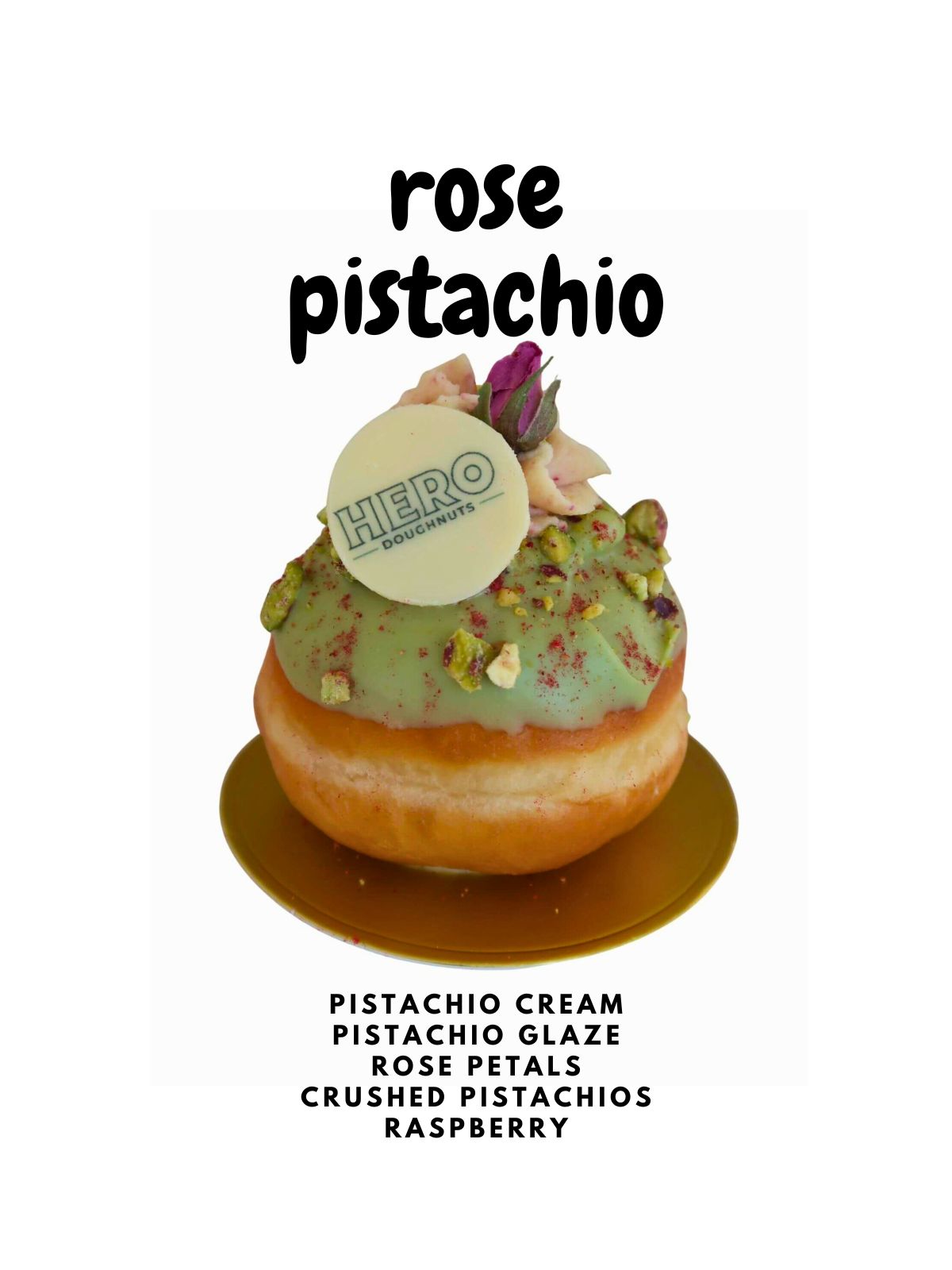 Indulge in our Rose Pistachio HERO Doughnuts - Dozen: pistachio cream doughnuts with green pistachio glaze, rose petals, crushed pistachios, a chocolate disk, and raspberry. Experience luxury doughnut delivery today!.