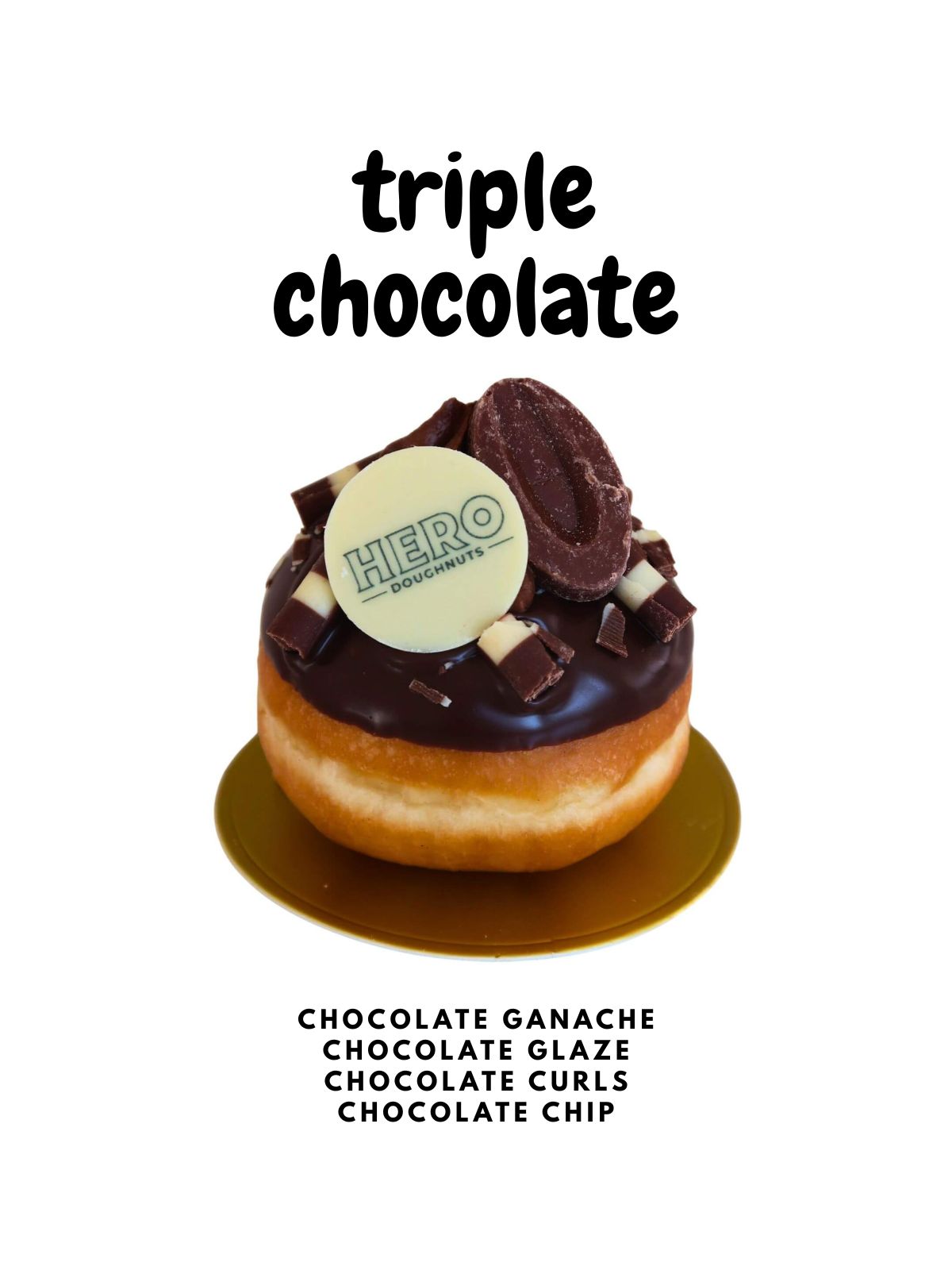 Triple Chocolate HERO Doughnuts - Dozen: Indulge in rich chocolate donuts topped with glaze, curls, chips, and a white chocolate disc—ideal for triple chocolate lovers or as the ultimate chocolate delivery in London.