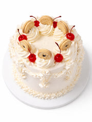 Vintage Victoria sponge birthday cake showing the cake and decorations from the top, delivered in London