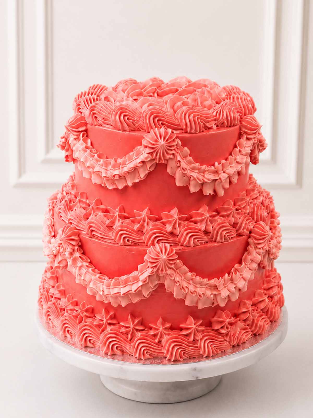 Two-tiered Vintage cake with customisable flavours and features, handmade in London. 